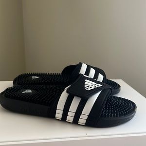 Kids Addidas slides size 4, light wear.